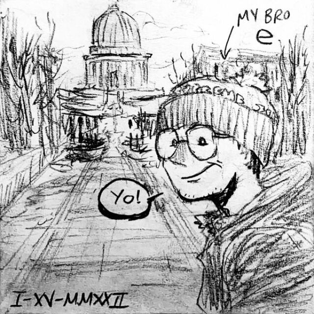 Elijah stands in front of the Madison capital building and says Yo! A caption points to him and reads “My bro E”.